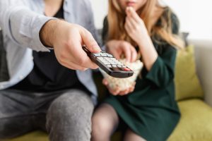 Couple watching internet tv with Kingdom Telco connection